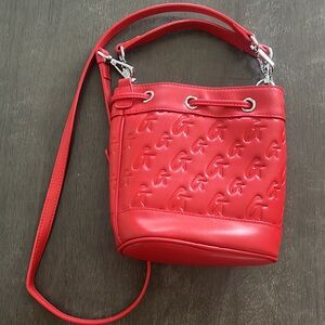 Red glamaholic purse. New condition worn one time .
